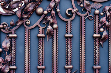 Wall Mural - Decorative metal gates of blue and yellow colors with wrought iron elements