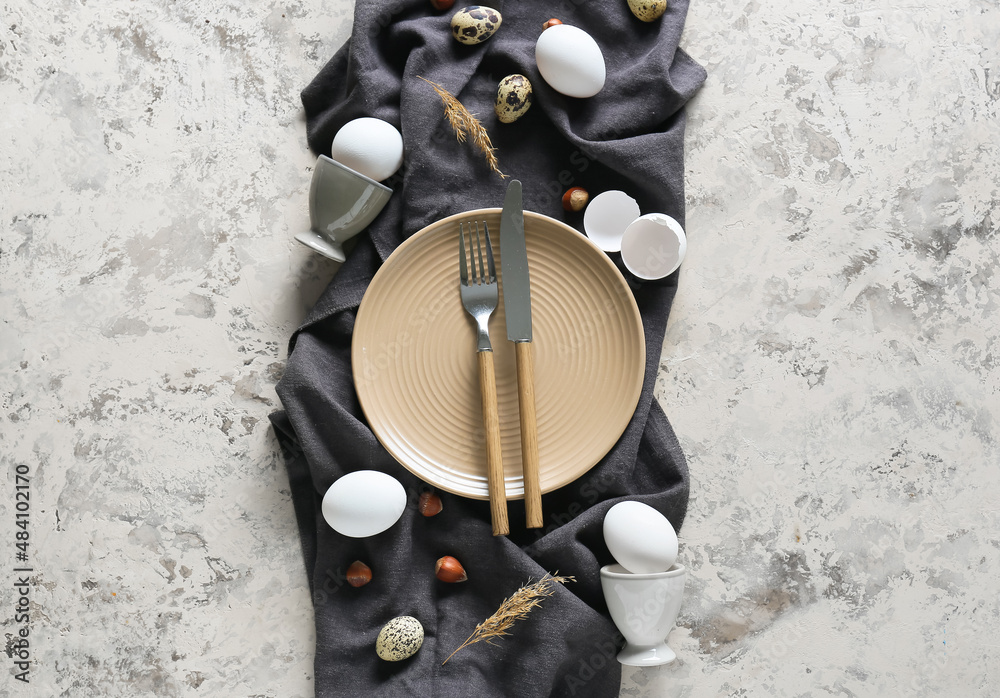 Beautiful Easter table setting on grunge background