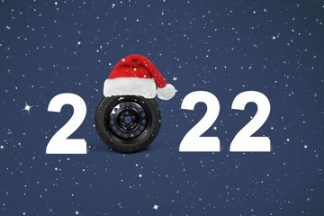 Sticker - 2022 Auto wheel in Santa's hat. New Year for auto workshop, auto shop.