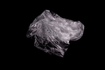 Poster - white plastic bag isolated on a black background