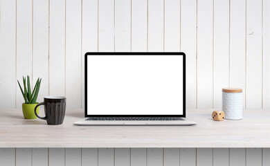 Aufkleber - Lapop on desk with isolated white screen for mockup, app or web page design promotion. White wooden wall in background