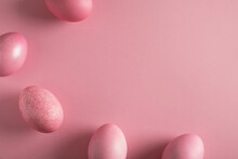 Pink Easter Eggs Painted By Hand On Pastel Background. Easter Minimal Composition. Top View, Flat Lay, Copy Space