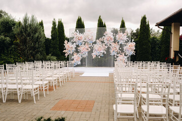 Wall Mural - A place for a wedding ceremony on the street. Decorated wedding venue