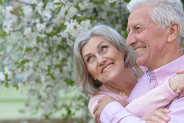 Sticker - happy senior couple possing in park