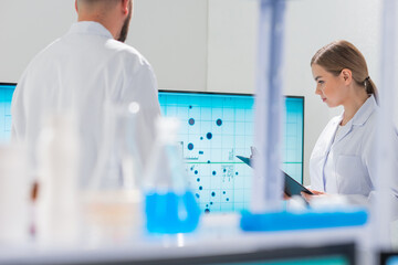 Wall Mural - professional team of scientists is working on a vaccine in a modern scientific research laboratory. 