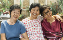 Happy Senior Society Concept. Portrait Of Asian Female Older Ageing Women Smiling With Happiness In Garden At Home, Or Wellbeing County