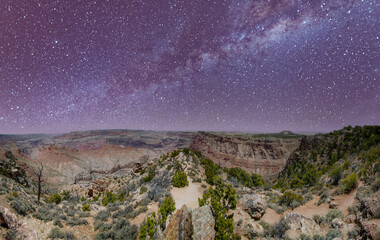 Sticker - Panoramic aerial view of Grand Canyon South Rim on a starry night.