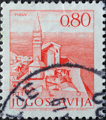 Wall Mural - Yugoslavia - circa 1972 : a postage stamp from Yugoslavia, showing the Church in Piran.