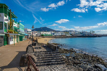 View Of Restaurants And Shops Overlooking Playa Blanca Beach, Playa Blanca, Lanzarote, Canary Islands