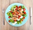 © julijacernjaka - Classic Caesar salad with tomato, chicken and egg