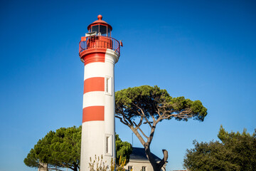 Wall Mural - Old red lighthouse in La Rochelle harbor, France
