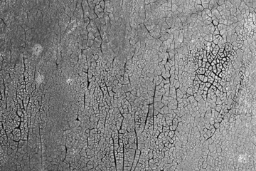 Wall Mural - Black and white monochrome grunge pattern. Cool texture of cracks, stains, scratches, splash for print and design. Cracked oil paint on wooden surface.