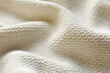 © New Africa - Beautiful white knitted fabric as background, closeup