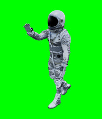 Wall Mural - Astronaut isolated on green background perfect for photo compositing