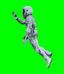 Wall Mural - Astronaut isolated on green background perfect for photo compositing