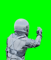 Wall Mural - Astronaut isolated on green background perfect for photo compositing
