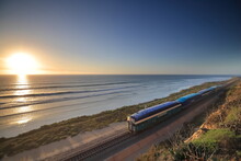 Amtrak Trains Along The San Diego Coastline At Dusk
