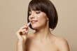 © SHOTPRIME STUDIO - woman lipstick cosmetics attractive look posing isolated background