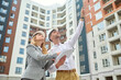 © zinkevych - Two people examining a new construction object