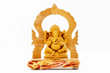 Wall Mural - Close up wooden statue of Lord Ganesha on white