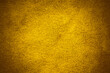 © peterkai - Back real golden leather textured background.