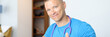 © megaflopp - Portrait of young smiling male doctor holding thumbs up