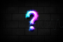 Question Mark Neon Light Design On Brick Wall