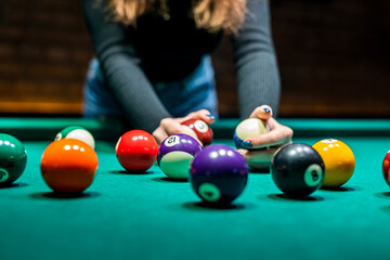 beautiful young girl came on a weekend to play billiards for curiosity.