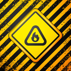 Canvas Print - Black Fire flame in triangle icon isolated on yellow background. Warning sign of flammable product. Warning sign. Vector