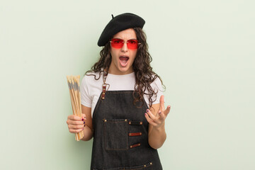 Wall Mural - young pretty hispanic woman looking angry, annoyed and frustrated. artist concept