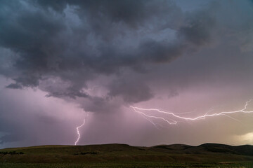 Wall Mural - Lightning bolt coming out of storm clouds
