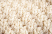 Closeup Beige Knitted Woolen Fabric Texture Background
