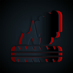 Poster - Paper cut Lying burning tires icon isolated on black background. Paper art style. Vector