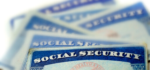 Wall Mural - Social Security Cards Representing Finances and Retirement Pension and Senior Care