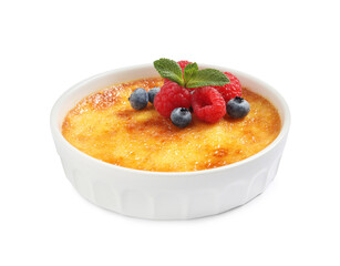 Delicious creme brulee with fresh berries isolated on white