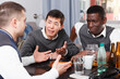 © JackF - Three friends are talking about life together at home.