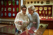 © JENOCHE - mother and daughter looking at expositions of previous centuries in museum