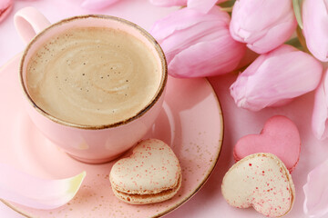 Wall Mural - French sweet cookies macarons macaroons and vintage pink cup on marble background.