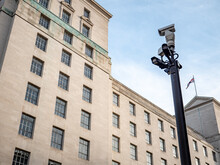 Security CCTV Cameras Watching Over An Anonymous Ministry Of Defence Government Building In Whitehall, The Heart Of UK Politics And Governance.