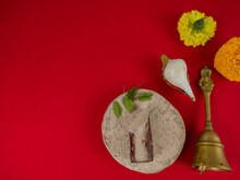 Puja Essentials Ghanta, Puja Bell, Conch Shell,sandalwood And Marigold Flower Used In Hindu Rituals. These Are Used In Durga , Saraswati , Kali , Laxmi Puja, Shivaratri.