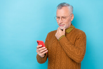 Sticker - Photo of thoughtful man use gadget decide network comment wear jumper isolated blue color background