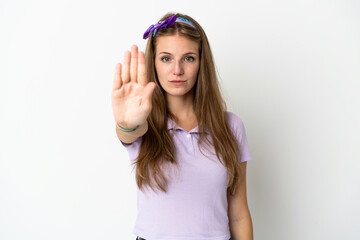 Canvas Print - Young caucasian woman over isolated background making stop gesture