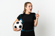 © luismolinero - Young football player woman isolated on white background thinking an idea pointing the finger up