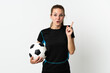 © luismolinero - Young football player woman isolated on white background intending to realizes the solution while lifting a finger up