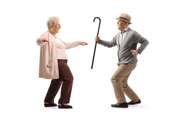 Canvas Print - Cheerful senior man and woman dancing