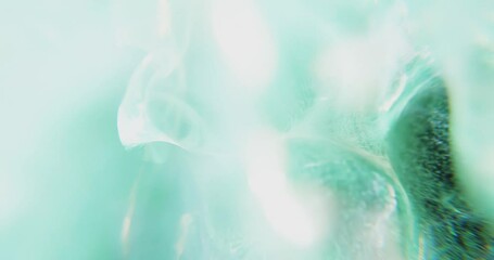 Poster - smooth flowing abstract blue green turquoise ink smoke with wave and swirl motion background. 4k loo