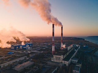 Wall Mural - Industrial factory pollution, smokestack exhaust gases. Industry zone, thick smoke. Climate change and global warming