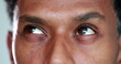 © Marco - Pensive african american descent close-up eyes macro. Thoughtful Closeup black person eye looking up thinking