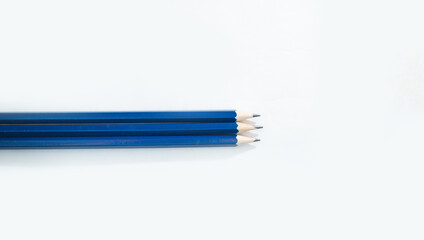 Sticker - Blue pencils with an eraser. A collection of office supplies, using a pencil for sketches, abstract and minimalist style.