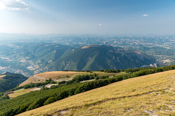 Wall Mural - Panoramic view towards north from the summit of Monte Nerone in the Pesaro Urbino province (Marche, Italy). Monte Montiego in the foreground.